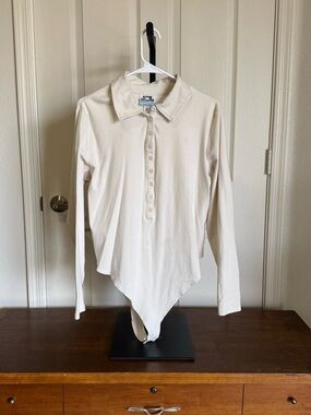 Future Collective Long-Sleeve Polo Bodysuit in Cream